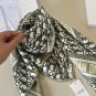 ch 110Dior classic printed handkerchief pays tribute to the classic Oblique print.T_1313