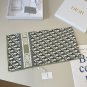 ch 110Dior classic printed handkerchief pays tribute to the classic Oblique print.T_1313