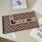 ch 110Dior classic printed handkerchief pays tribute to the classic Oblique print.T_4239
