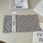 ch 110Dior classic printed handkerchief pays tribute to the classic Oblique print.T_4241