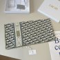 ch 110Dior classic printed handkerchief pays tribute to the classic Oblique print.T_4242