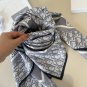 ch 110Dior classic printed handkerchief pays tribute to the classic Oblique print.T_4243