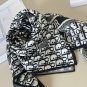 ch 110Dior classic printed handkerchief pays tribute to the classic Oblique print.T_4247