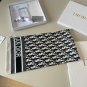 ch 110Dior classic printed handkerchief pays tribute to the classic Oblique print.T_5653