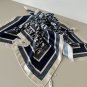 ch 110Dior classic printed handkerchief pays tribute to the classic Oblique print.T_5654