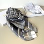 ch 110Dior classic printed handkerchief pays tribute to the classic Oblique print.T_5699