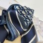 ch 110Dior classic printed handkerchief pays tribute to the classic Oblique print.T_5700