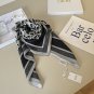 ch 110Dior classic printed handkerchief pays tribute to the classic Oblique print.T_7682
