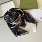 ch 110Gucci's new handkerchief with Gucci animal and floral printsThe brand's colle_5683