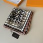 ch 110LV new square scarfThe LV Tiles silk square scarf outlines the border with a_3283
