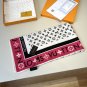 ch 110Lv's new silk handkerchiefThis Monogram Infinity handkerchief is set against_6550