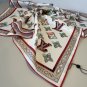 ch 110The Monogram LV Locks handkerchief delicately depicts the legendary hard box lo