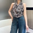 hundred and seventy-fiveA rare Chanel used silk scarf with a clever pattern of white