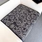 hundred and seventy-fiveA rare Chanel used silk scarf with a clever pattern of white