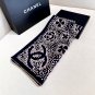 hundred and seventy-fiveA rare Chanel used silk scarf with a clever pattern of white