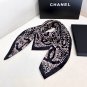 hundred and seventy-fiveA rare Chanel used silk scarf with a clever pattern of white