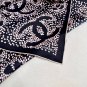 hundred and seventy-fiveA rare Chanel used silk scarf with a clever pattern of white