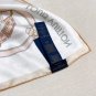 hundred and thirtyThe Flower And Straps silk handkerchief showcases an elegant style_1886