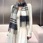 is new! BURBERRY 100% cashmere unisex! Stunning! Dressed in a beautiful outfit, it's u