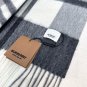 is new! BURBERRY 100% cashmere unisex! Stunning! Dressed in a beautiful outfit, it's u