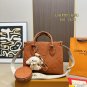 135 fold box Lv tote with wide shoulder strap and small coin purse. Size is just right 25