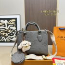 135 fold box Lv tote with wide shoulder strap and small coin purse. Size is just right 25_771