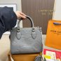 135 fold box Lv tote with wide shoulder strap and small coin purse. Size is just right 25_771