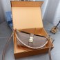 Comes with a foldable gift boxLV Pochette Mia handbag from Louis Vuitton, featuring clas