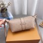 Comes with a foldable gift boxLV Pochette Mia handbag from Louis Vuitton, featuring clas