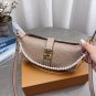 Comes with a foldable gift boxLV Pochette Mia handbag from Louis Vuitton, featuring clas