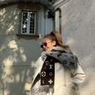 It's winter! The Lv scarf has to say that their black flower design really captures my hea