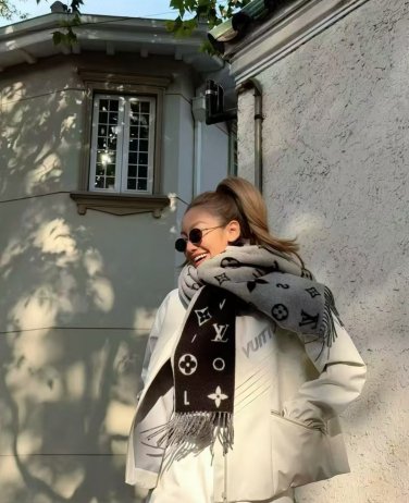 It's winter! The Lv scarf has to say that their black flower design really captures my hea