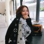 It's winter! The Lv scarf has to say that their black flower design really captures my hea