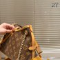 Leather version P170LV Carryall BB handbagThe LV Carryall BB handbag is made of classi