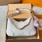 Leather version p195LV Boulogne Postman Bun Bull Horn BunThe new Boulogne has a smalle