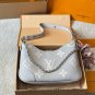 Leather version p195LV Boulogne Postman Bun Bull Horn BunThe new Boulogne has a smalle