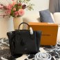 LV Handheld Dumpling Bun P235The interaction between smooth and perforated calf leather