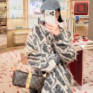 LV new vintage lunch box bagThe magnetic buckle also has a large internal capacity that