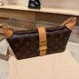 LV new vintage lunch box bagThe magnetic buckle also has a large internal capacity that