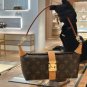 LV new vintage lunch box bagThe magnetic buckle also has a large internal capacity that