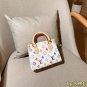 one hundred and twenty-fiveLV onthego Louis Vuitton White Tri Color Mini Jungle BagS