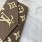 p100The LV M80496 elegantly completes the portofoilysara with a beautiful two-color mo