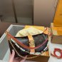 p120D-108 size 21 × 12 folding boxThe LV Pochette Mia handbag from Louis Vuitton has
