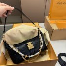 p120D-108 size 21 × 12 folding boxThe LV Pochette Mia handbag from Louis Vuitton has_1086