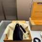 p120D-108 size 21 × 12 folding boxThe LV Pochette Mia handbag from Louis Vuitton has_1086
