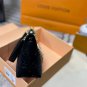 P125 gift box packagingLV Pochette Mia handbag from Louis Vuitton, featuring classic Mon