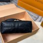 P125 gift box packagingLV Pochette Mia handbag from Louis Vuitton, featuring classic Mon