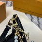 P125 gift box packagingLV Pochette Mia handbag from Louis Vuitton, featuring classic Mon