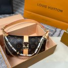 P125 gift box packagingLV Pochette Mia handbag from Louis Vuitton, featuring classic Mon_583