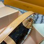 P125 gift box packagingLV Pochette Mia handbag from Louis Vuitton, featuring classic Mon_583